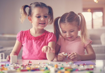 Fototapeta premium Girls playing at home.