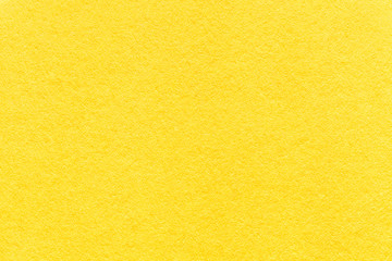 Texture of old light yellow paper background, closeup. Structure of dense lemon cardboard - obrazy, fototapety, plakaty
