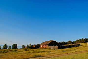 Baikal lake coast summer landscape, view from a cliff, Russia