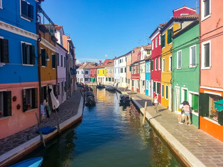 Fototapeta na wymiar View of a small channel at Island Burano Venice Italy