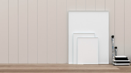 Blank white picture canvasses and paint brushes
