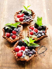 Tartlets with cheese and berries
