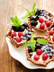 Tartlets with cheese and berries