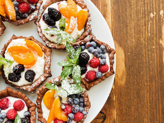 Tartlets with cheese and berries