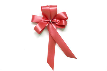 Red bow as award ribbon on white background