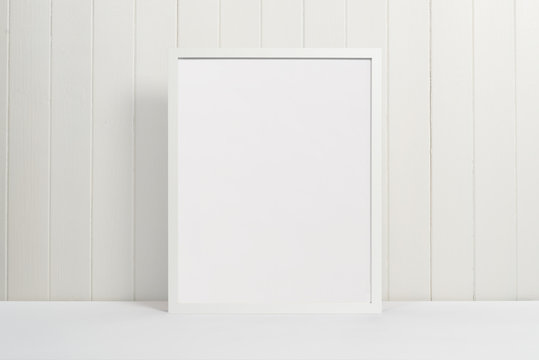 White picture frame on white background 