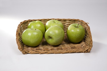 Apples placed in basket 