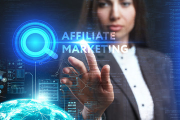 The concept of business, technology, the Internet and the network. A young entrepreneur working on a virtual screen of the future and sees the inscription: Affiliate marketing