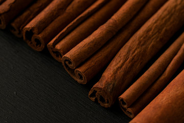 Cinnamon sticks dark photo