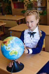 Girl at school desks