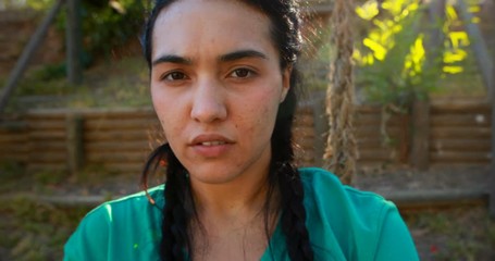 Portrait of girl standing in boot camp - Powered by Adobe