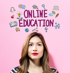 Online Education text with young woman on a pink background