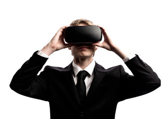 Businessman with a virtual reality headset isolated on a white background