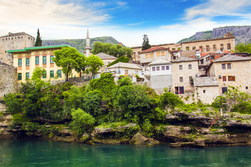 Fototapeta na wymiar A beautiful view of the Neretva River in Mostar, Bosnia and Herzegovina, on a sunny summer day