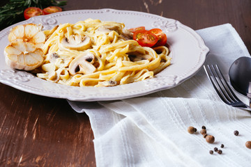 Creamy Italian pasta with mushrooms, tomatoes