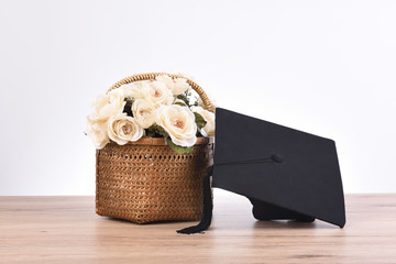 Congratulations flower and hat for text university graduates