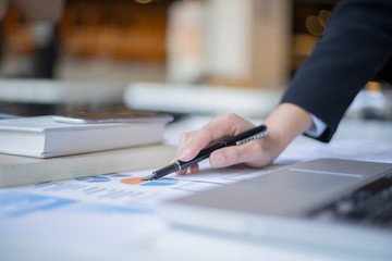 business people discussing document in meeting room