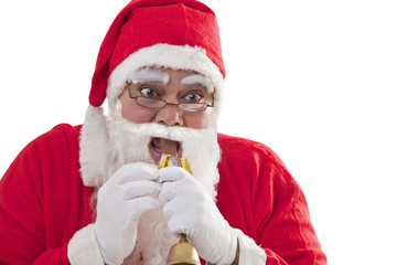 Close-up of Santa Claus eating chocolate bar over white background 