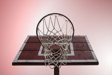 Basketball hoop with vintage wooden board on gradient background