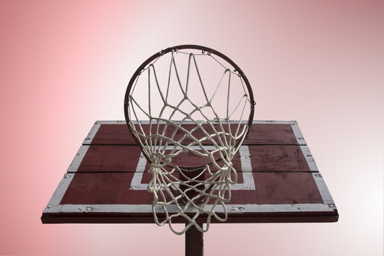 Basketball hoop with vintage wooden board on gradient background