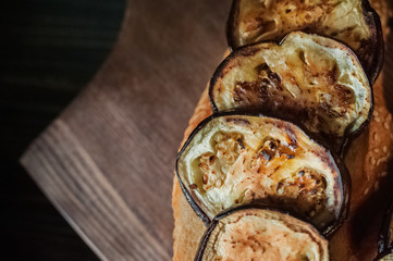 Slices of toasted eggplant.
