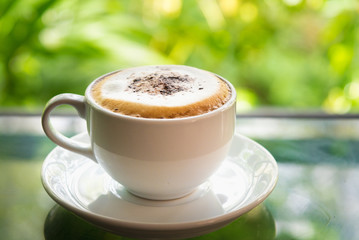 white cup of coffee