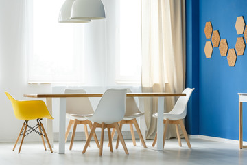 Scandinavian white and yellow chairs