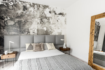 Bedroom with abstract grunge wall