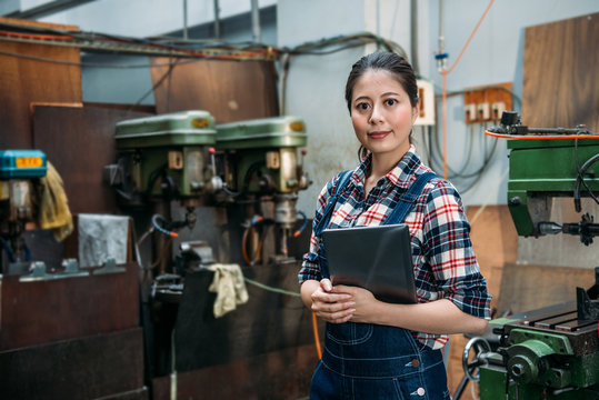 Factory Woman Holding Digital Tablet Computer