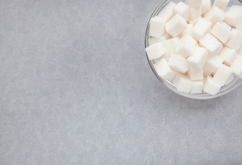 White sugar in right corner with copy space, can be used as background for food concepts.