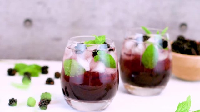 Fresh blackberry drink lime mint and ice