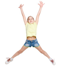 Happy teenage girl jumping on white isolated background