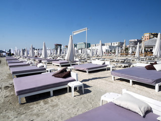 MAMAIA, ROMANIA -JULY ¨20:, 2017 Empty beach with umbrellas and sun loungers , July 20, 2017 in  Mamaia, Romania