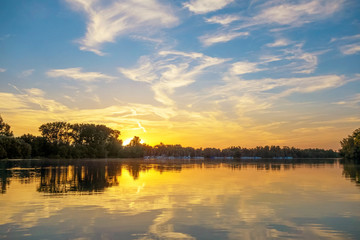 Sunrise / sunset at a lake