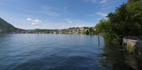 The Parco Ciani with its trees in the foreground and the houses of Lugano in the background - Lugano, Lake Lugano, Lugano, Ticino, Switzerland, Europe