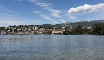 Fototapeta na wymiar View from the Parco Ciani to the houses of Lugano - Lugano, Lake Lugano, Lugano, Ticino, Switzerland, Europe