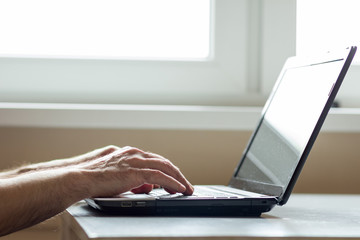 Closeup of woman with laptop