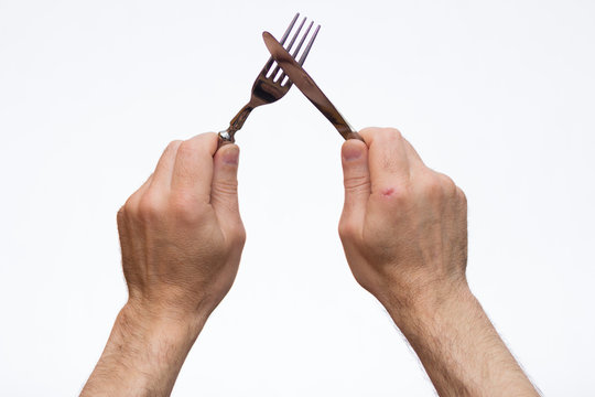 Knife and fork in hands