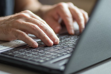 Closeup of woman with laptop