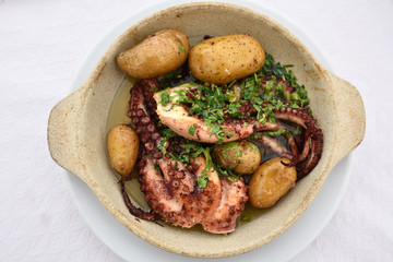 Grilled octopus with batatas a murro. Portugal