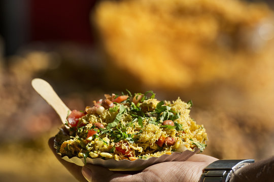 Man Holding Bhelpuri Plate