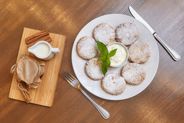 Cottage cheese pancakes or fritters. Traditional Russian and Ukrainian cuisine