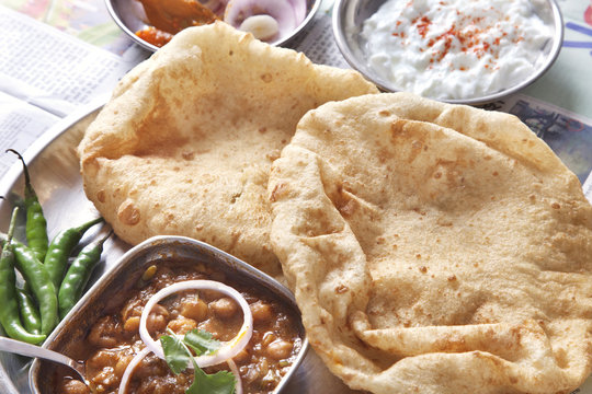 Close-up chole bhature served at table