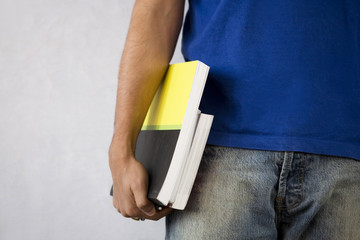 Student holding a book 