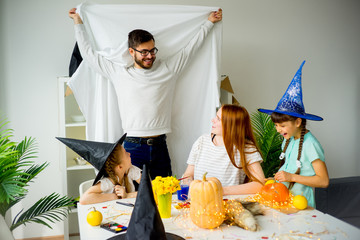Father in a ghost costume