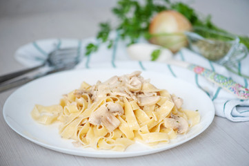 Pasta with champignons and sauce