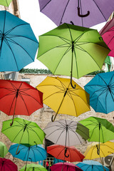 Fototapeta na wymiar Artistic roof made of colorful umbrellas