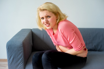Girl suffering from a stomachache