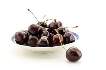 The bowl of cherries isolated.