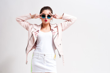 Cool hipster student woman wearing eyewear glasses . Caucasian female university student looking at camera smiling happy.